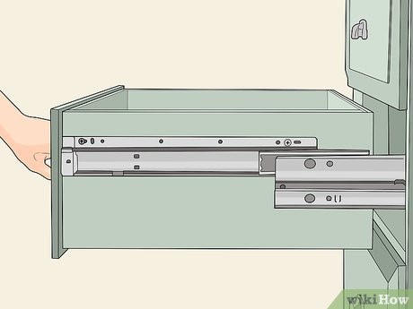 how to remove drawers with metal glides and no levers
