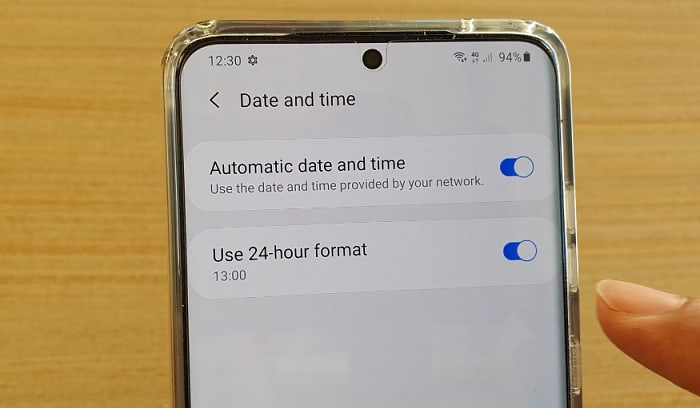 how to change to military time on iphone
